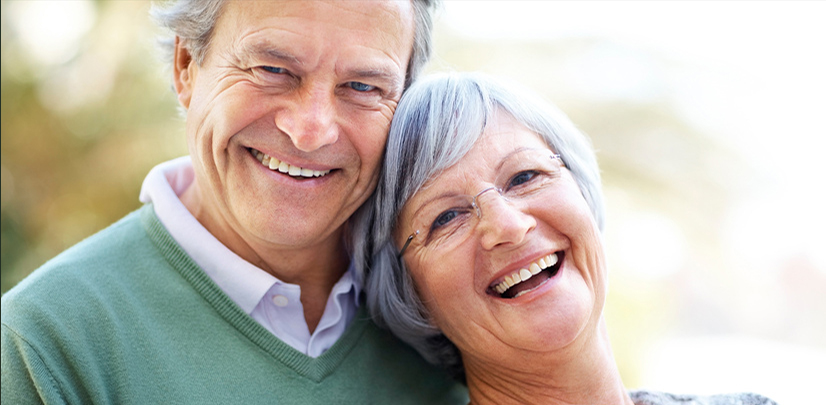 Closeup portrait of happy mature couple enjoying together - Outdoor
